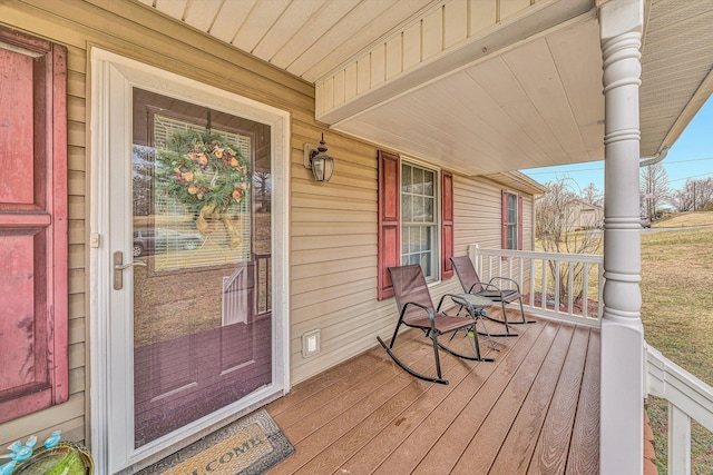 wooden terrace featuring a porch