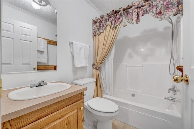 bathroom featuring toilet, a textured ceiling, shower / bath combo with shower curtain, and vanity