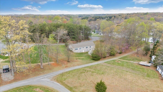 drone / aerial view with a forest view
