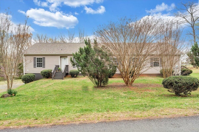 ranch-style house with a front lawn
