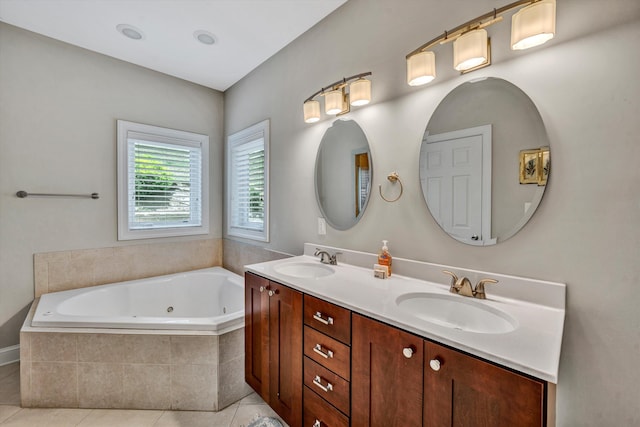 bathroom featuring tile patterned flooring, a sink, a jetted tub, and double vanity