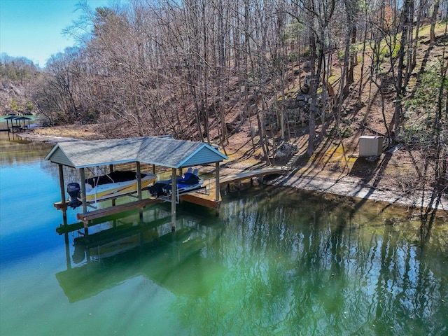 view of dock with a water view and boat lift