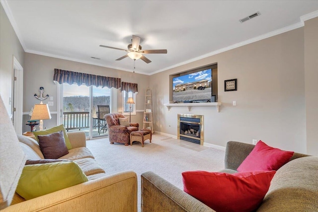 living area with carpet floors, a fireplace with flush hearth, baseboards, and ornamental molding