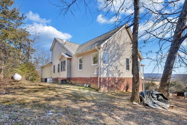 view of property exterior featuring cooling unit