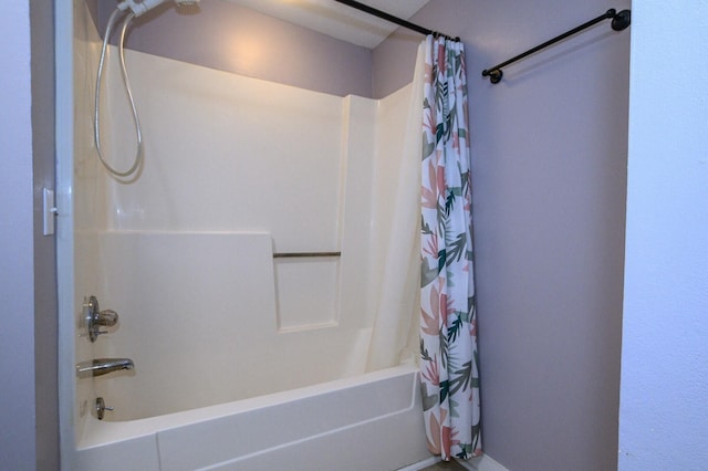 bathroom with shower / bath combo