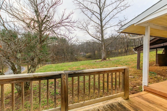 deck featuring a lawn