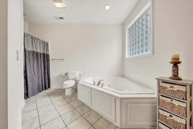 bathroom with visible vents, a shower with shower curtain, toilet, tile patterned flooring, and a tub with jets