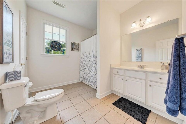 full bath with baseboards, visible vents, toilet, tile patterned floors, and vanity