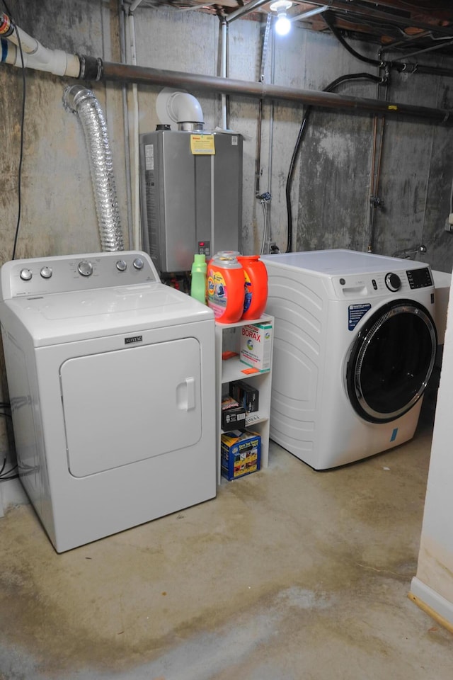 laundry area with laundry area and separate washer and dryer