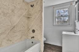 full bathroom featuring vanity and bathing tub / shower combination