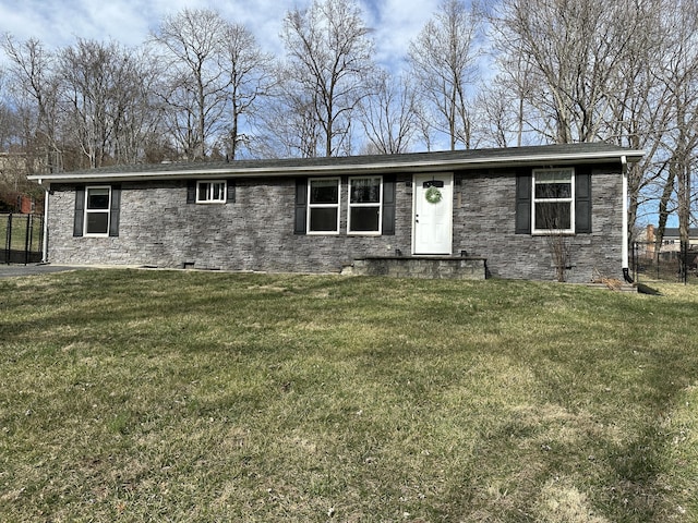 single story home with stone siding, a front lawn, crawl space, and fence