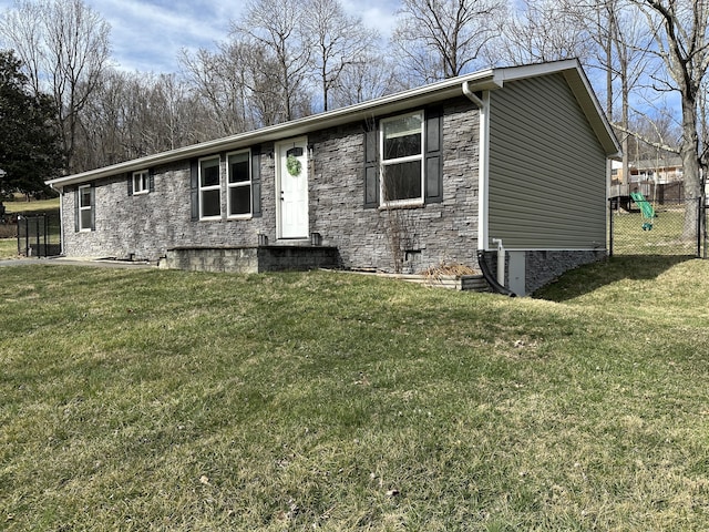 ranch-style house with crawl space, fence, and a front lawn