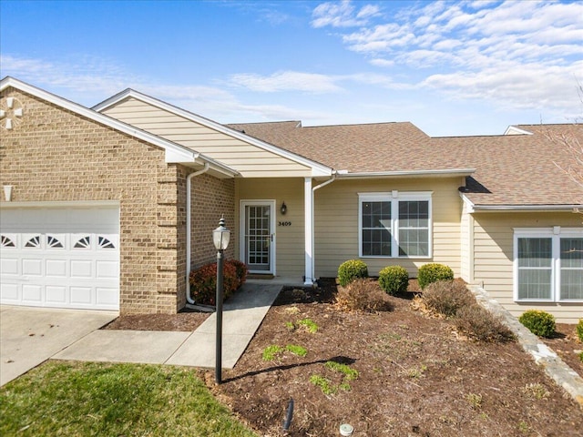 ranch-style home with brick siding, a shingled roof, and a garage