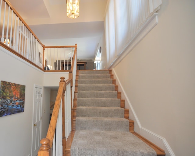 3370 Kelly Lane Ext, Roanoke, VA 24018 - stairs with a chandelier, a high ceiling, and wood finished floors