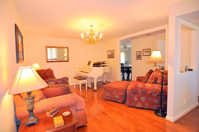 3370 Kelly Lane Ext, Roanoke, VA 24018 - living room with wood finished floors, a chandelier, and a ceiling fan