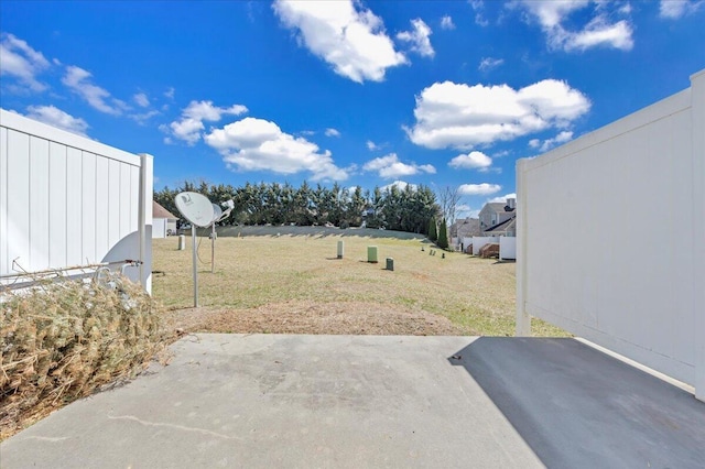 view of yard with a patio area and fence