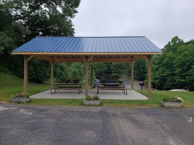 surrounding community featuring a yard and a gazebo