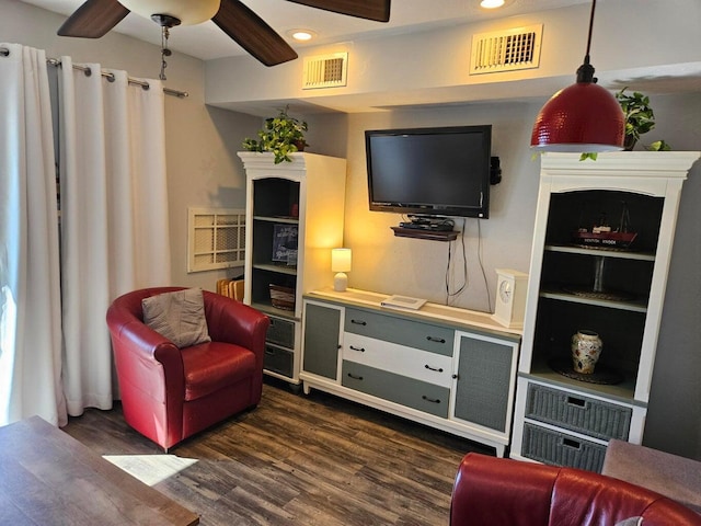 living area with recessed lighting, ceiling fan, dark wood finished floors, and visible vents