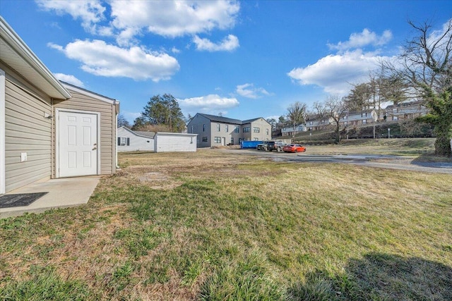 view of yard featuring a residential view