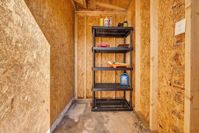 interior space featuring unfinished concrete floors