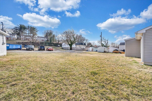 view of yard featuring a residential view