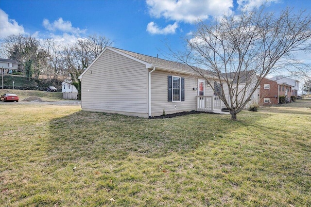 ranch-style home with a front lawn