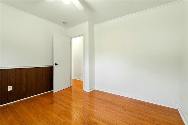 2351 Reese Mountain Rd, Elliston, VA 24087 - spare room featuring wood finished floors, a ceiling fan, baseboards, and ornamental molding