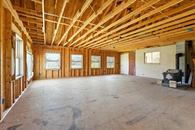 2351 Reese Mountain Rd, Elliston, VA 24087 - unfurnished living room featuring a wood stove