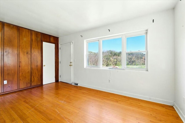 2351 Reese Mountain Rd, Elliston, VA 24087 - empty room with baseboards, light wood-style floors, and visible vents