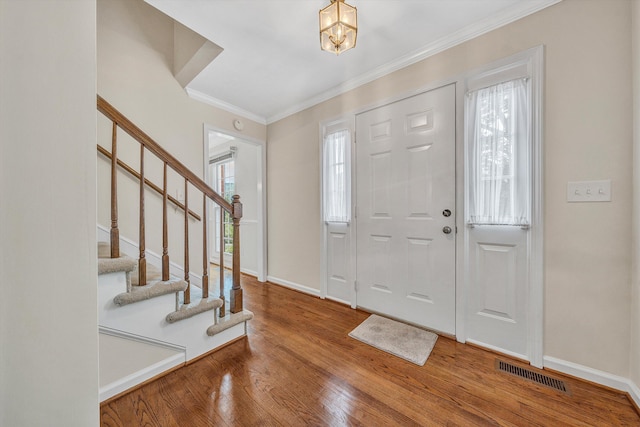 5653 Orchard Valley Cir, Roanoke, VA 24018 - foyer featuring crown molding, stairs, baseboards, and wood finished floors