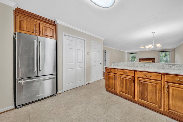 5653 Orchard Valley Cir, Roanoke, VA 24018 - kitchen featuring high end fridge, brown cabinets, light countertops, a chandelier, and crown molding