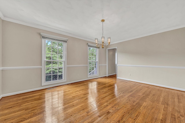 5653 Orchard Valley Cir, Roanoke, VA 24018 - unfurnished room featuring a chandelier, wood finished floors, baseboards, and ornamental molding