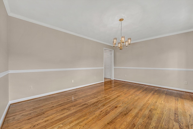 5653 Orchard Valley Cir, Roanoke, VA 24018 - empty room with a chandelier, wood finished floors, baseboards, and crown molding