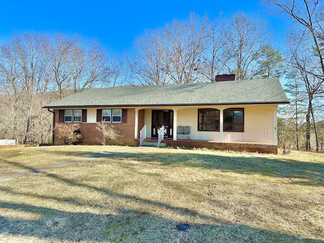 ranch-style house with a shingled roof, a chimney, a front lawn, and a porch