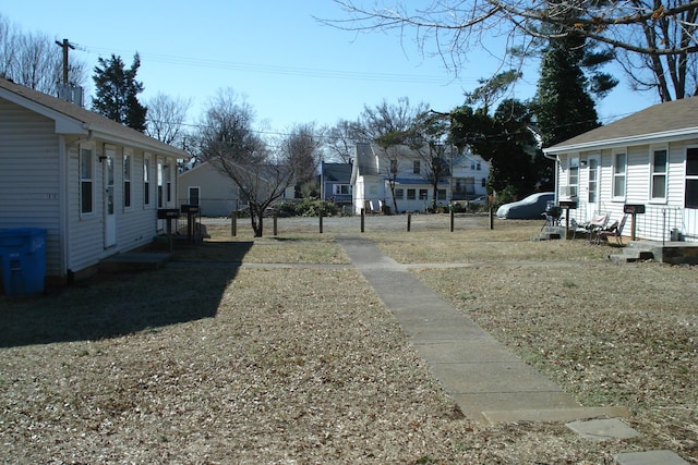 view of yard featuring a residential view