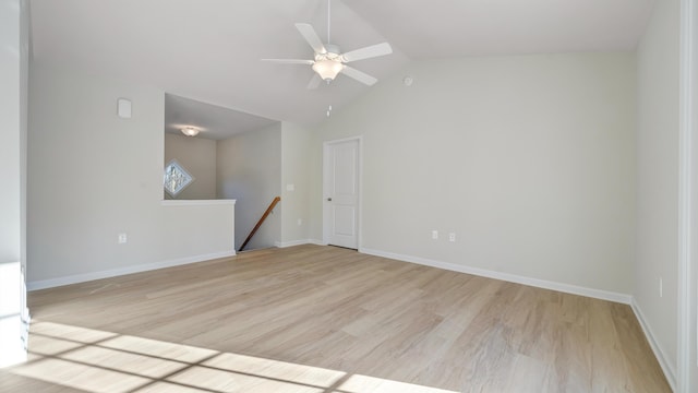 2809 Russlen Dr, Salem, VA 24153 - empty room featuring light wood-style flooring, vaulted ceiling, ceiling fan, and baseboards