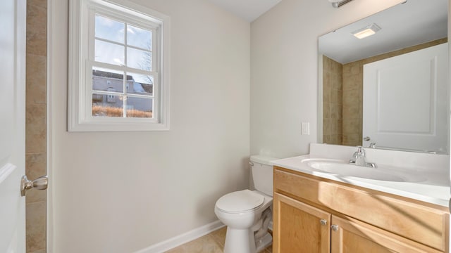 2809 Russlen Dr, Salem, VA 24153 - bathroom with toilet, vanity, baseboards, and tile patterned floors