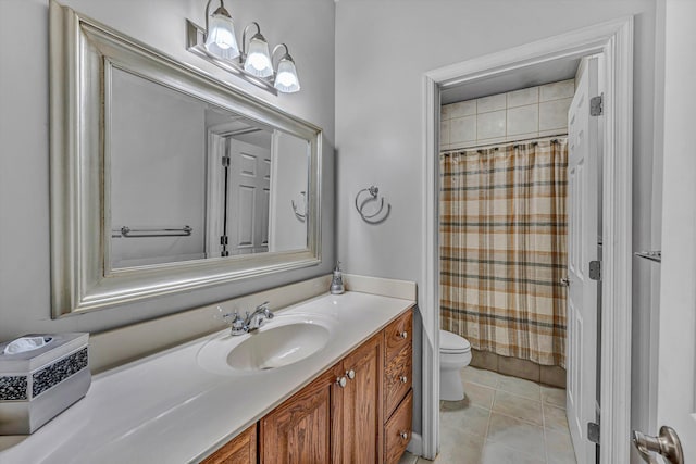 bathroom with tile patterned floors, a shower with curtain, toilet, and vanity