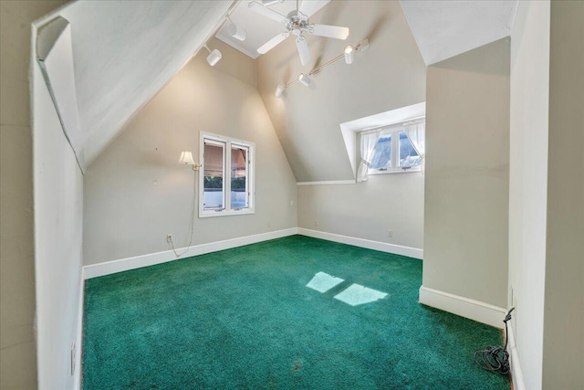 bonus room featuring ceiling fan, baseboards, vaulted ceiling, and carpet flooring