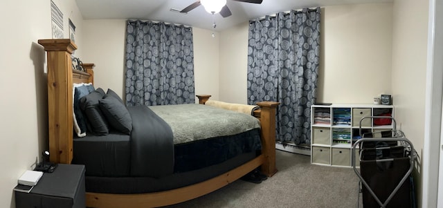 carpeted bedroom featuring a ceiling fan, lofted ceiling, and a baseboard heating unit