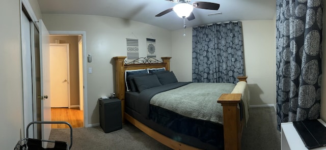 bedroom with visible vents, carpet flooring, a ceiling fan, and baseboards