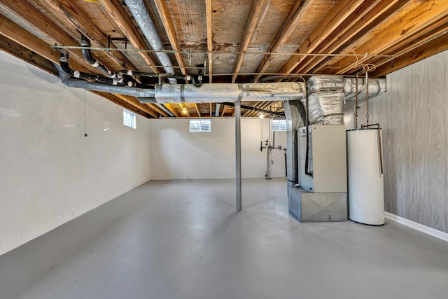 basement with water heater and heating unit