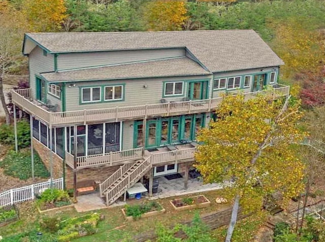 368 Penninsula Pt, Lynch Station, VA 24571 - back of house featuring a patio, roof with shingles, and a sunroom