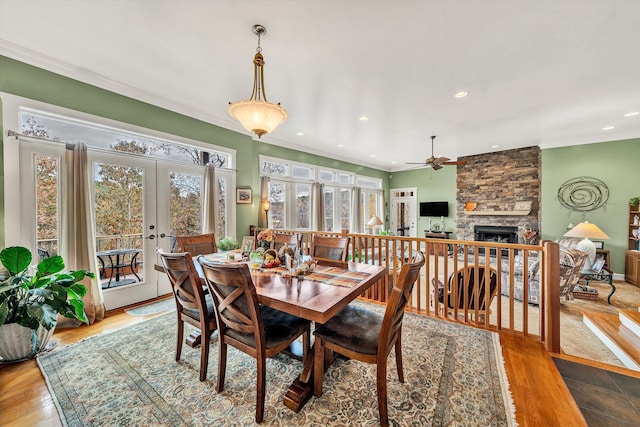 368 Penninsula Pt, Lynch Station, VA 24571 - dining area featuring french doors, a ceiling fan, a stone fireplace, recessed lighting, and ornamental molding