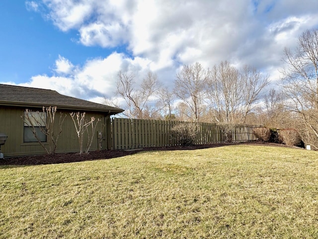 view of yard featuring fence