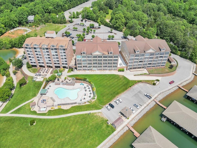 birds eye view of property featuring a water view