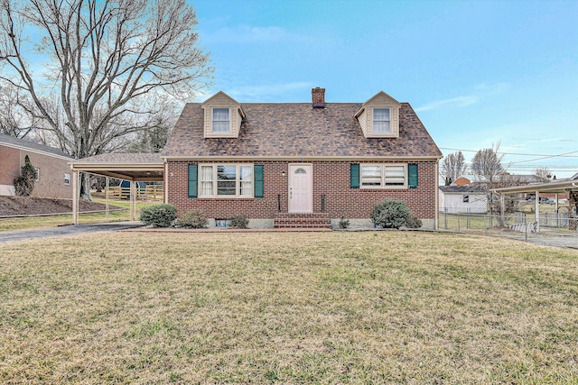 cape cod home featuring brick siding, fence, an attached carport, and a front yard