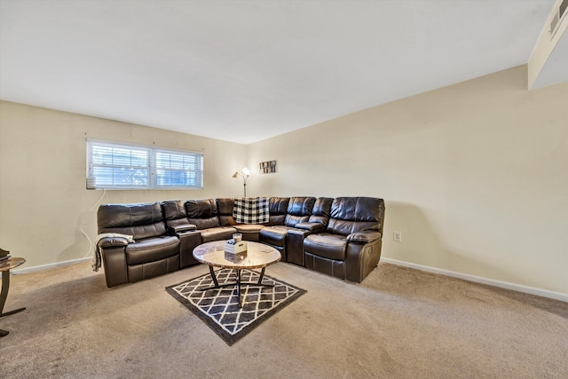 carpeted living room featuring baseboards