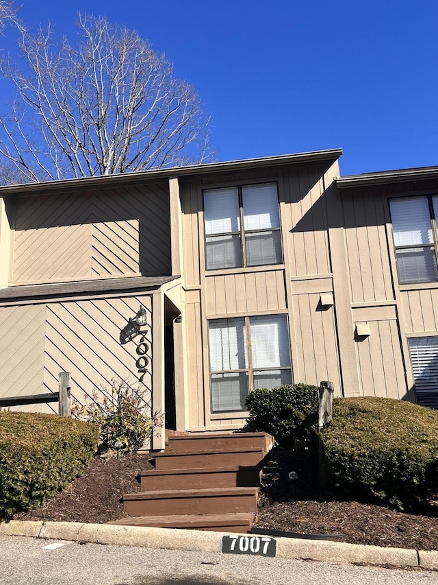 view of front of house with board and batten siding