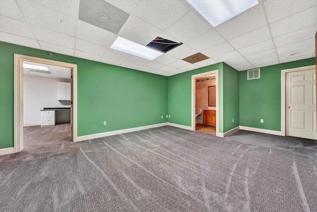 interior space with carpet floors, visible vents, and baseboards